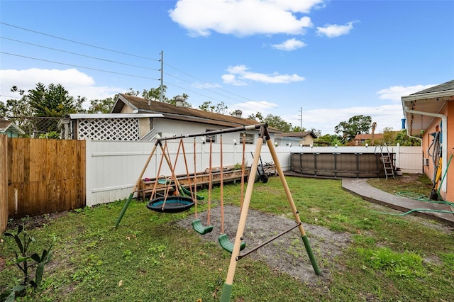 view of yard featuring a pool