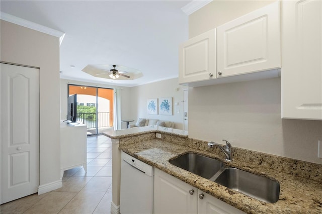 kitchen with dishwasher, white cabinets, ceiling fan, and sink