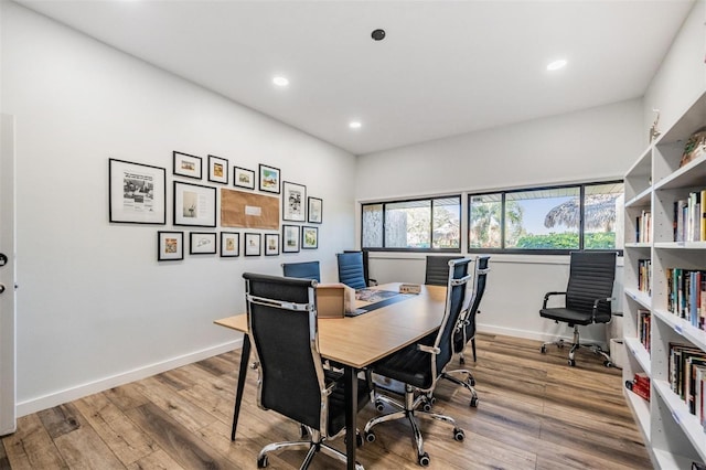 office space with hardwood / wood-style flooring