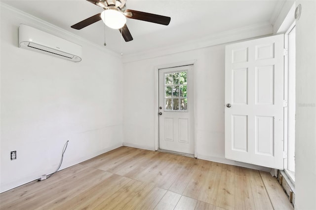 empty room with an AC wall unit, ceiling fan, light hardwood / wood-style flooring, and crown molding