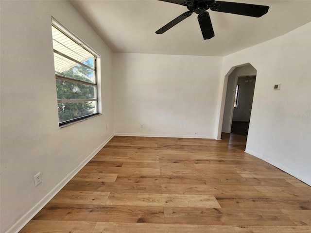 unfurnished room featuring ceiling fan and light hardwood / wood-style flooring