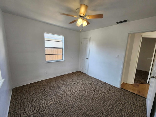 empty room with ceiling fan