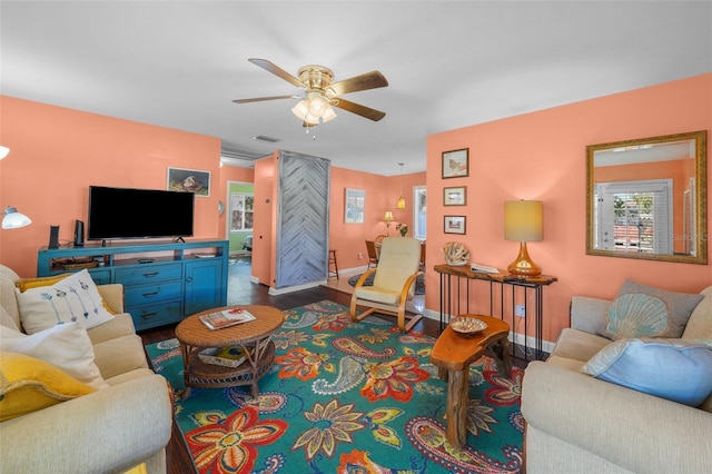 living room with ceiling fan and wood-type flooring