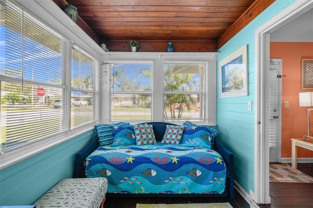 sunroom featuring wood ceiling