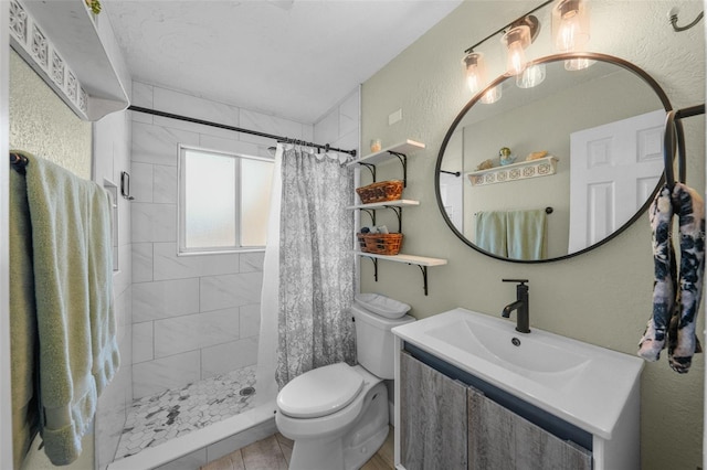 bathroom featuring a shower with curtain, vanity, and toilet