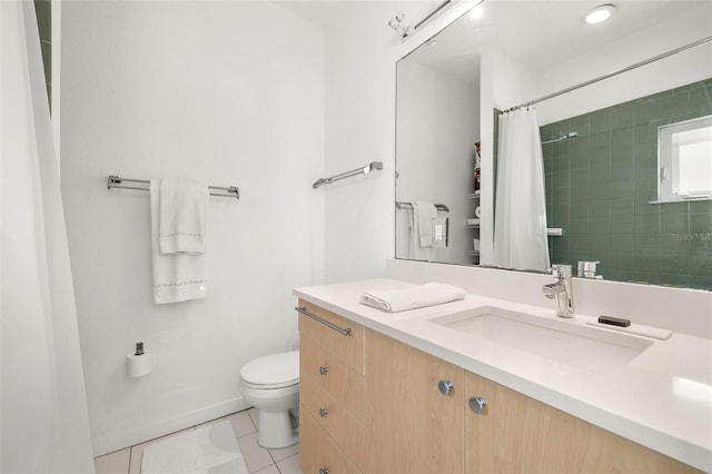 bathroom with toilet, vanity, tile patterned floors, and curtained shower