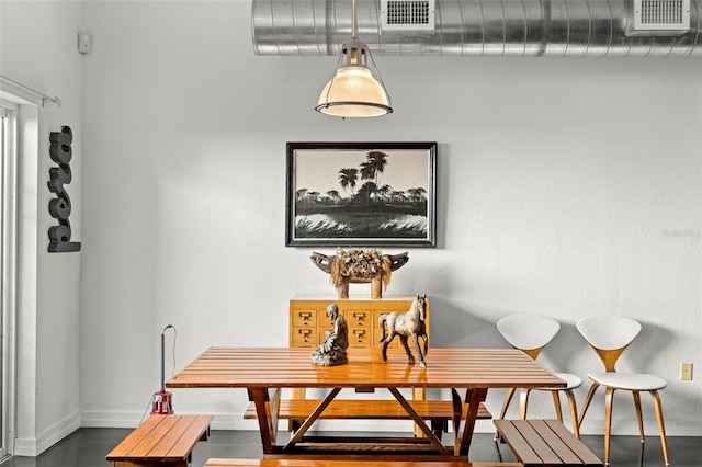 dining area with baseboards and visible vents