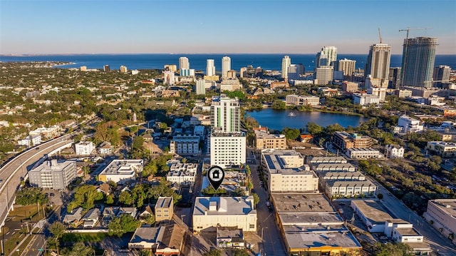 bird's eye view featuring a water view and a view of city