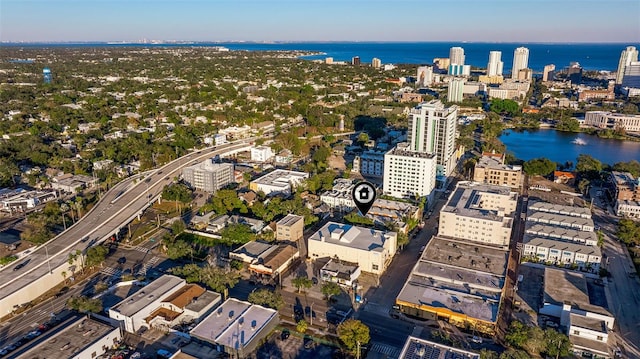 aerial view featuring a water view and a view of city