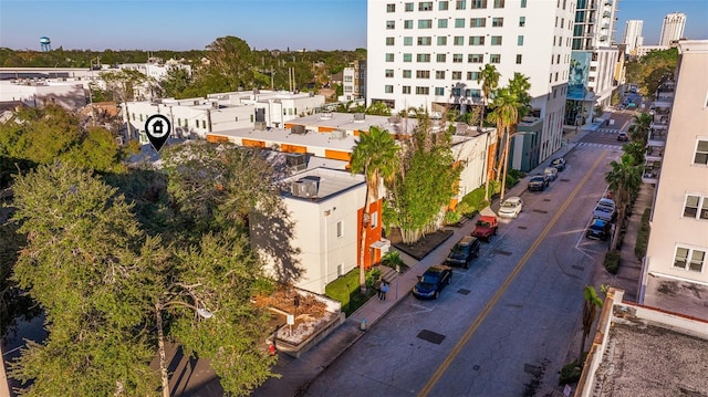 drone / aerial view featuring a city view