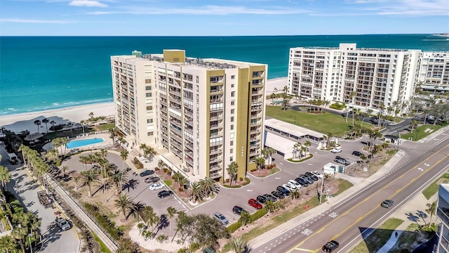 aerial view with a view of the beach and a water view