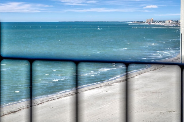 view of water feature with a beach view