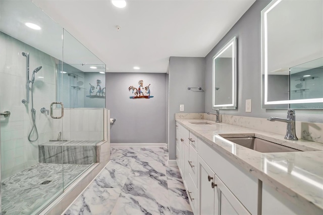 bathroom with vanity and an enclosed shower