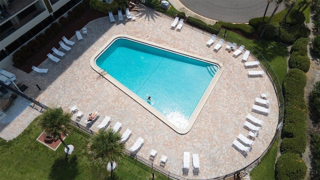 view of swimming pool with a patio