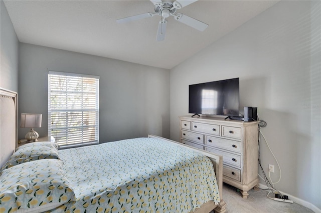 bedroom with lofted ceiling, light colored carpet, and ceiling fan