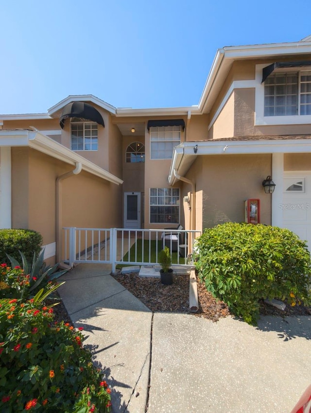 exterior space with stucco siding