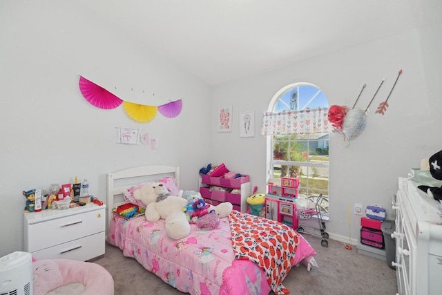 bedroom featuring light carpet