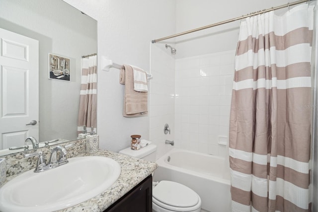 full bathroom with shower / bath combination with curtain, vanity, and toilet