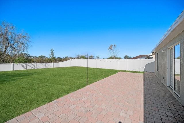 view of yard with a patio area