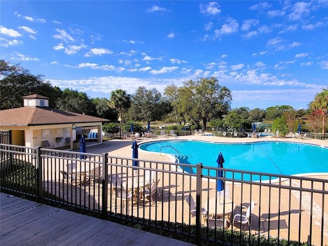 view of swimming pool featuring a patio