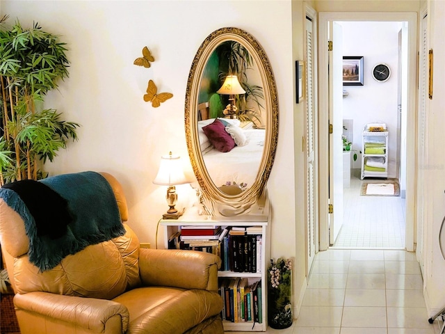 living area featuring light tile patterned floors