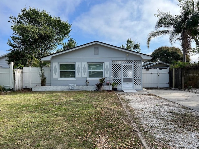 view of front of home with a front lawn