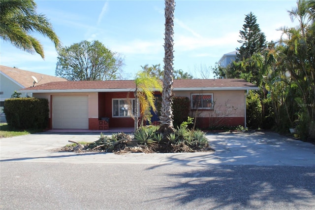 single story home featuring a garage