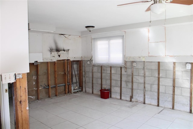 basement featuring ceiling fan