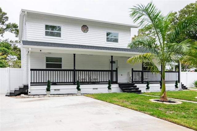 view of front facade with a front lawn