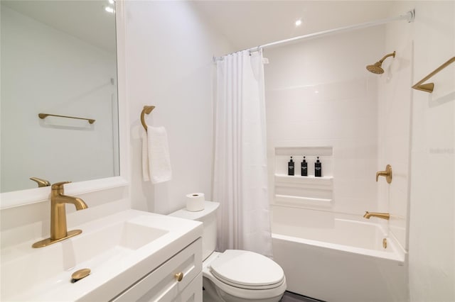 full bathroom featuring vanity, toilet, and shower / bath combo