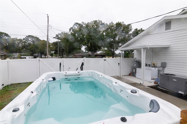 view of swimming pool with central AC