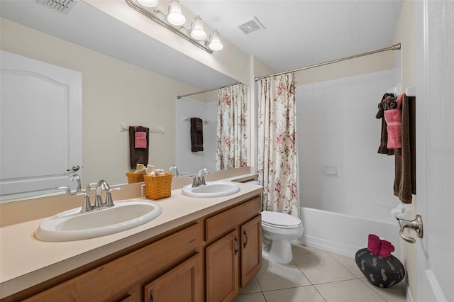 full bathroom with shower / tub combo, tile patterned flooring, vanity, and toilet