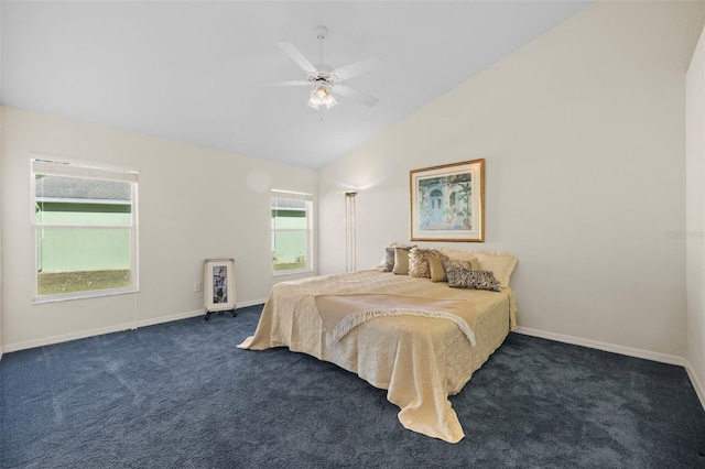 bedroom featuring lofted ceiling, ceiling fan, and dark colored carpet