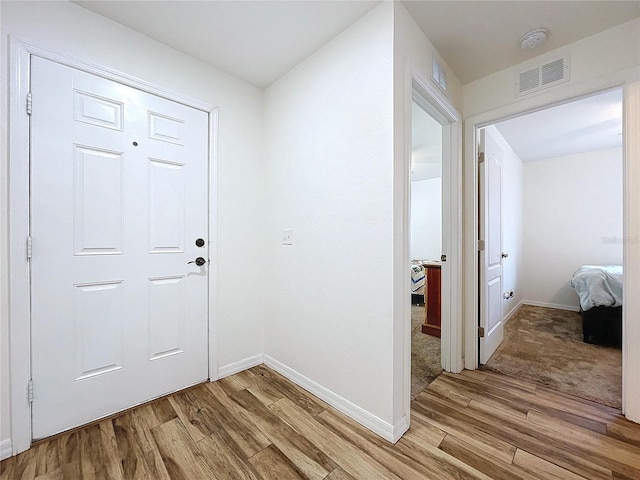 interior space with light hardwood / wood-style flooring