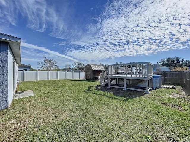 view of yard featuring a deck