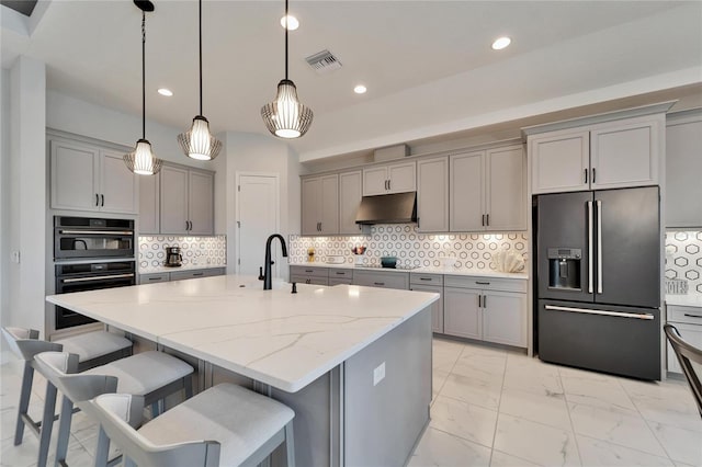 kitchen with marble finish floor, black appliances, and gray cabinets