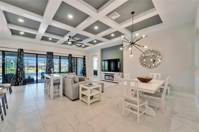 living room with coffered ceiling, marble finish floor, and visible vents