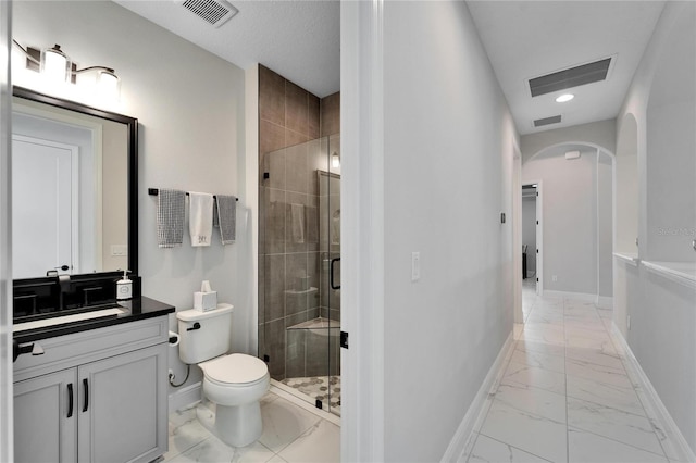 bathroom with marble finish floor, visible vents, and baseboards