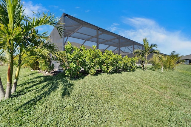 view of yard featuring a lanai