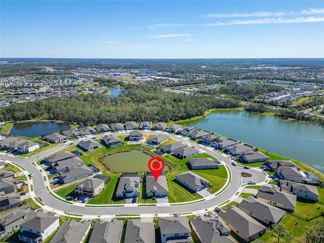 aerial view with a water view and a residential view