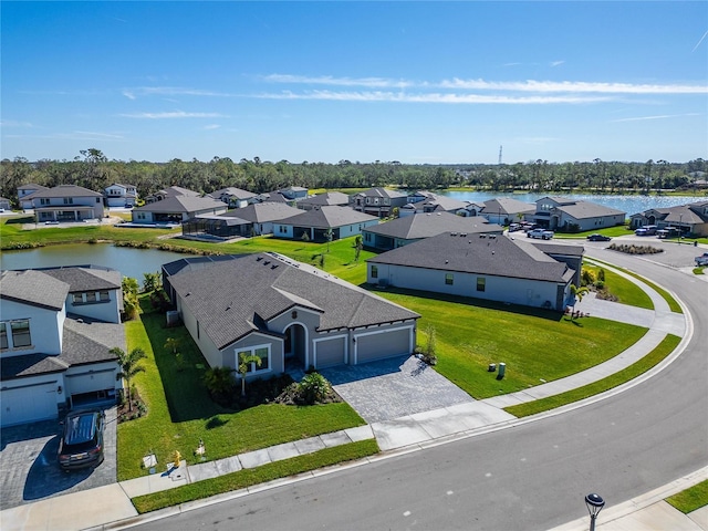 aerial view featuring a water view and a residential view