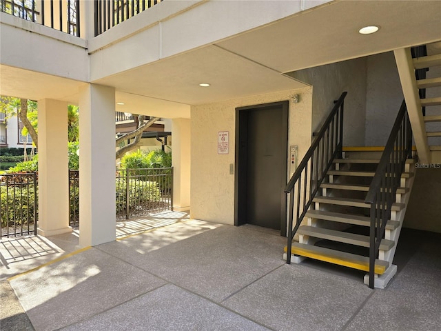 exterior space featuring a patio area and elevator