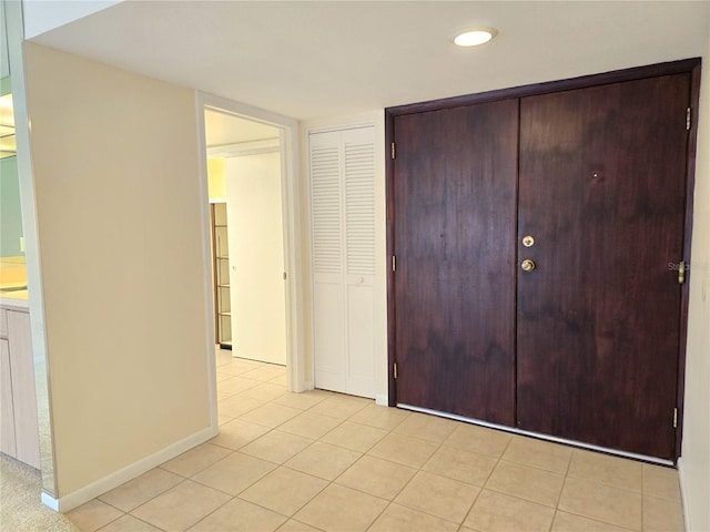 interior space featuring light tile patterned floors