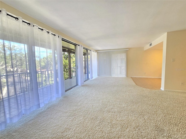 view of carpeted spare room