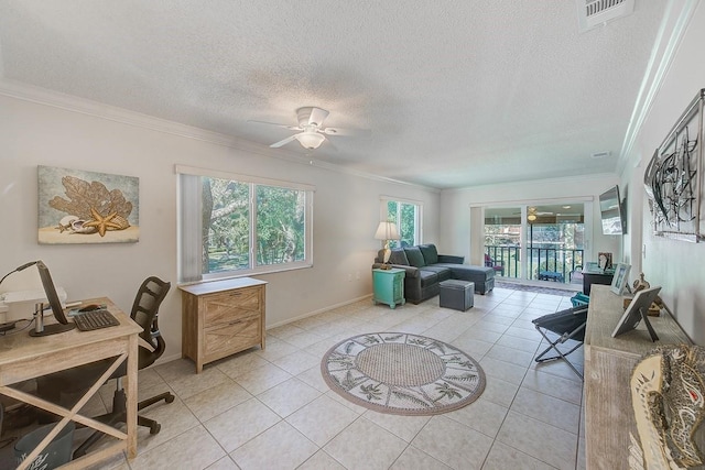 interior space with crown molding, ceiling fan, and a textured ceiling