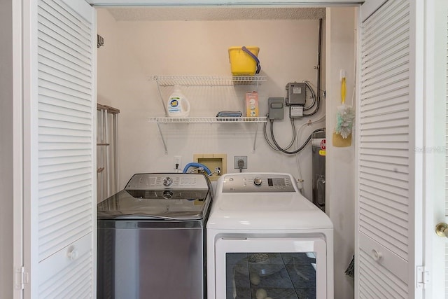 laundry area featuring washing machine and dryer