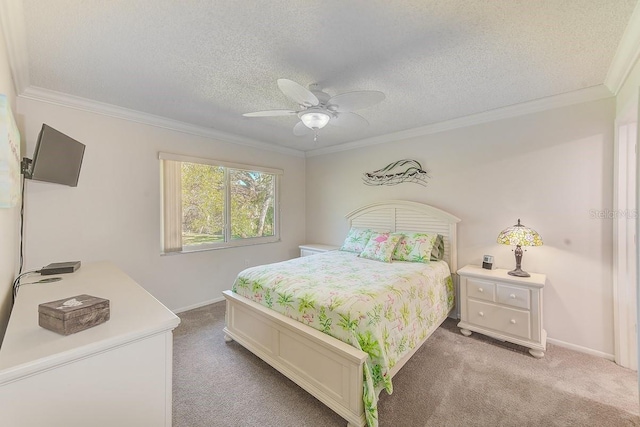 carpeted bedroom featuring crown molding, a textured ceiling, and ceiling fan