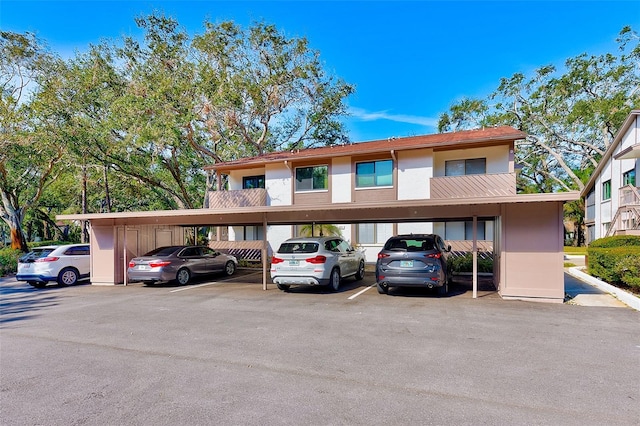 exterior space featuring a carport