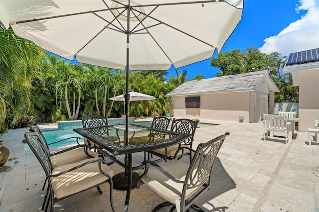 view of patio with an outdoor structure