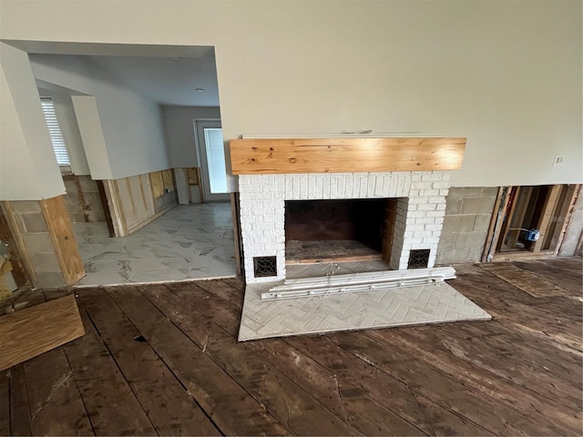 details with a fireplace and hardwood / wood-style floors